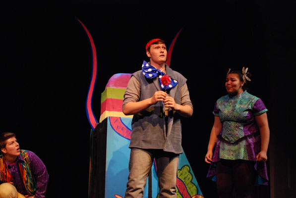 Students rehearse a scene from "Seussical: The Musical." Senior Ian Mooney stars as Horton the Elephant, junior Lauren Johnson as Gertrude McFuzz, and senior Liam Tobey as one of the Wickersham brothers. Photo by Bryn Estlund.